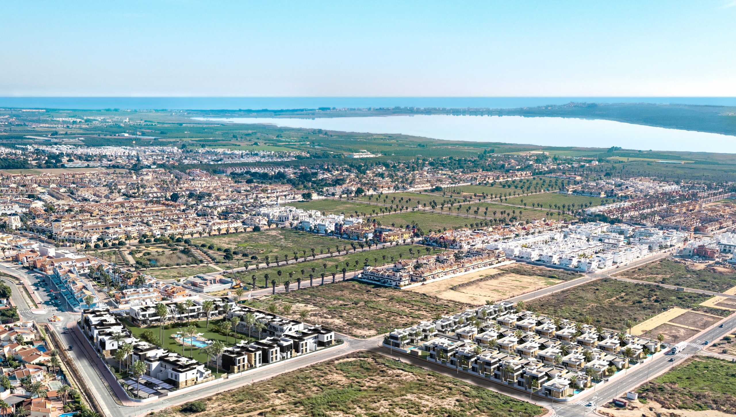 Aerial view of Ciudad Quesada with the Torrevieja salt lagoon in the background