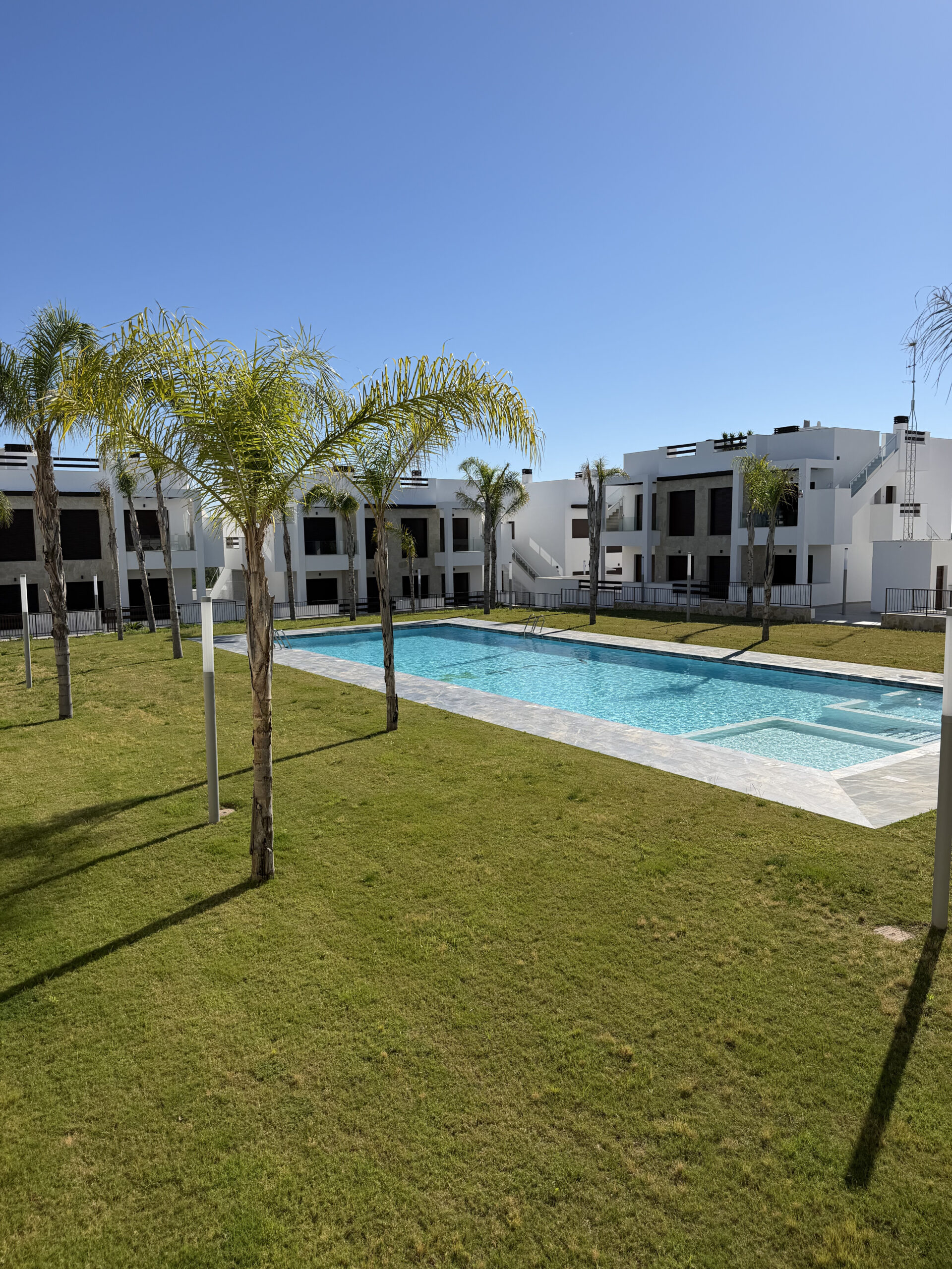 Communal swimming pool at a new build apartment complex in Torrevieja