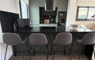 Kitchen island with bar stools