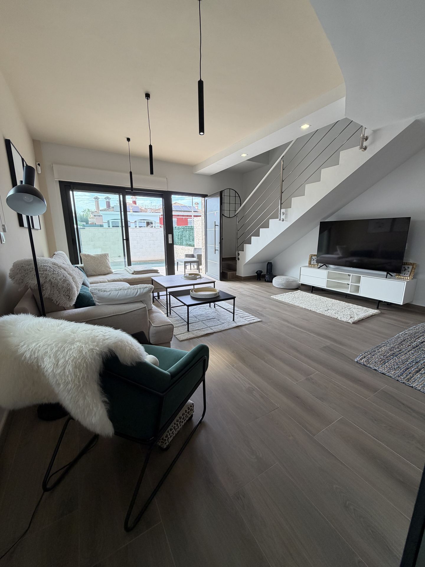 quad los montesinos living room 06 Bright living room with patio doors to the pool