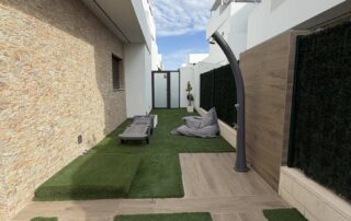 Side garden with outdoor shower
