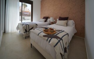 Twin bedroom with feature wall