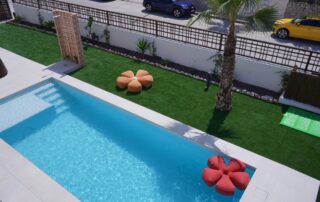 Landscaped garden with lawn and private pool