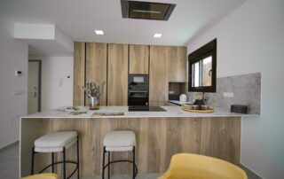 Modern fitted kitchen with breakfast bar