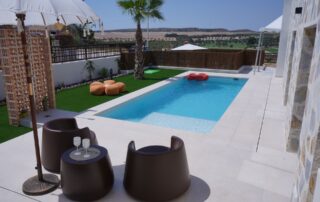Terrace seating overlooking the private pool